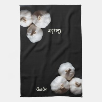 Three Whole Cloves of White Garlic Black