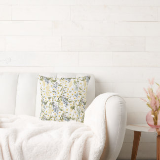 Throw Pillow with flowers in soft pastel shades.