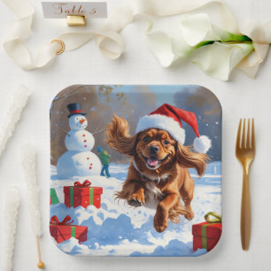 Tibetan Spaniel Running in Snow with Christmas Hat Paper Plates