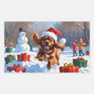 Tibetan Spaniel Running in Snow with Christmas Hat Rectangular Sticker