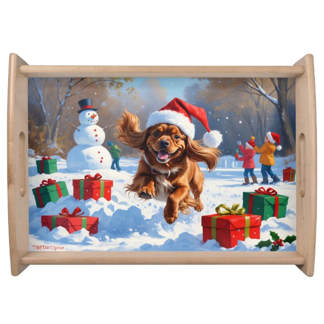 Tibetan Spaniel Running in Snow with Christmas Hat Serving Tray (Front)