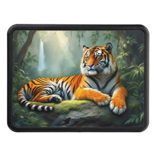 Tiger lounging in the jungle with waterfall hitch cover