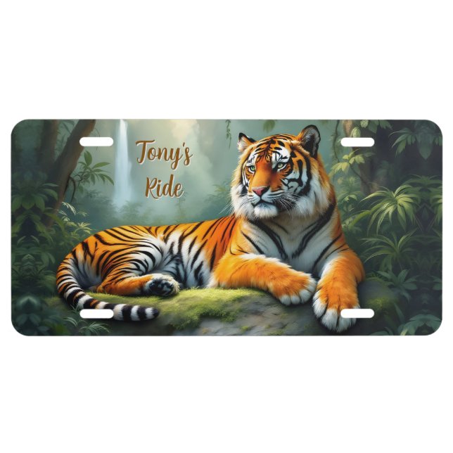 Tiger lounging in the jungle with waterfall license plate (Front)
