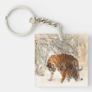 tigers on snow keychain