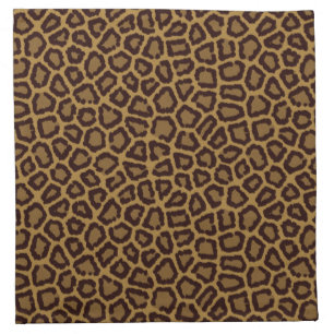 Tile background with a leopard fur napkin