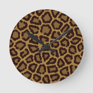 Tile background with a leopard fur round clock