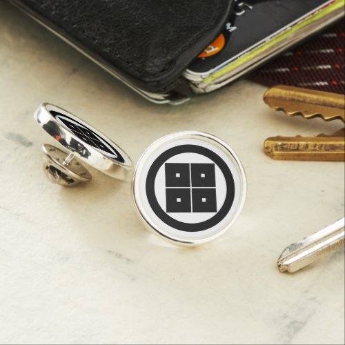 Tilted four_square_eyes in circle lapel pin