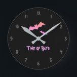 Time of Bats - Pink & Purple Abstract Pop Art Round Clock<br><div class="desc">Retro,  pop,  colorful creation of bats,  Round Clock.
Special theme of Pink & Purple coloring,  with simple but elegant icon styled art.
Original digital art by Raphael Studio - 'Bat'.
Retro pop style,  unique design.</div>