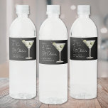 Tini Bit Older Martini Birthday Party Water Bottle Label<br><div class="desc">A Tini Bit Older Birthday Water Bottle Label. This playful design features a watercolor muted green martini glass with olives on the right side, paired with the phrase “A Tini Bit Older” at the top in stylish white handwritten script for a fun, cheeky vibe. The birthday person's name and age...</div>