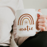 TINLEY Bohemian Burnt Orange Rainbow Sun Auntie Coffee Mug<br><div class="desc">This ceramic mug features a bohemian burnt orange terracotta rainbow with a sun inside and the word 'auntie' written in a handwritten brush font. This coffee cup is the perfect way to announce a new baby in the family and makes a great gift to your favorite aunt. 💜 COLORS ARE...</div>