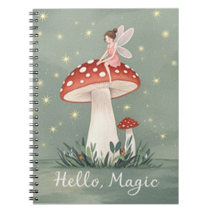 Tiny fairy perched on top of mushroom and glowing  notebook