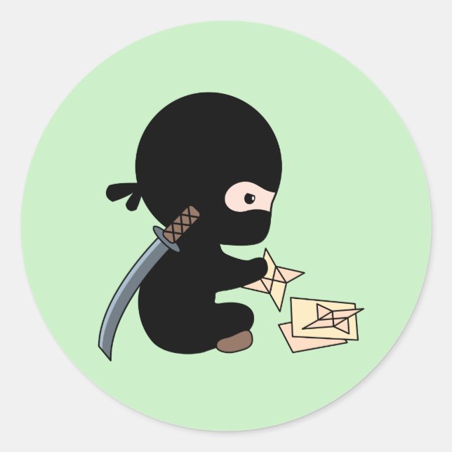 Tiny Ninja Making Origami Paper Throwing Star Classic Round Sticker (Front)