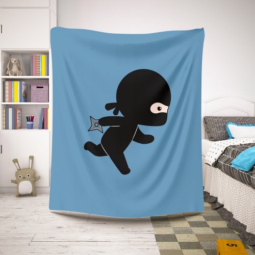Tiny Ninja Running on Blue Sherpa Blanket