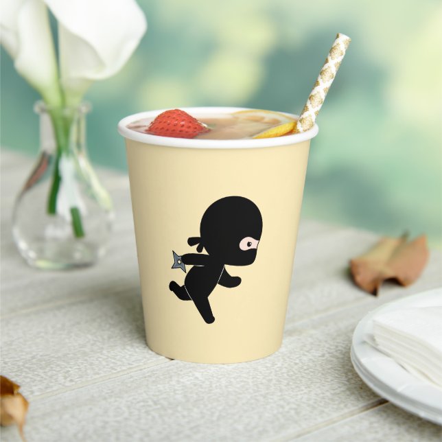 Tiny Ninja Running on Yellow Paper Cups (Insitu)