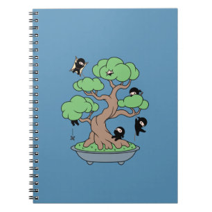 Tiny Ninjas in Bonsai Tree on Blue Notebook