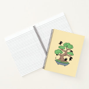 Tiny Ninjas in Bonsai Tree on Yellow Notebook