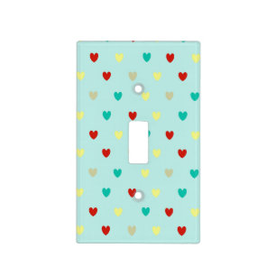 Tiny polka hearts on seafoam green light switch cover