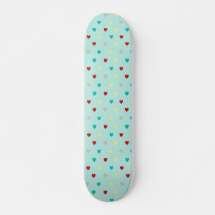 Tiny polka hearts on seafoam green skateboard