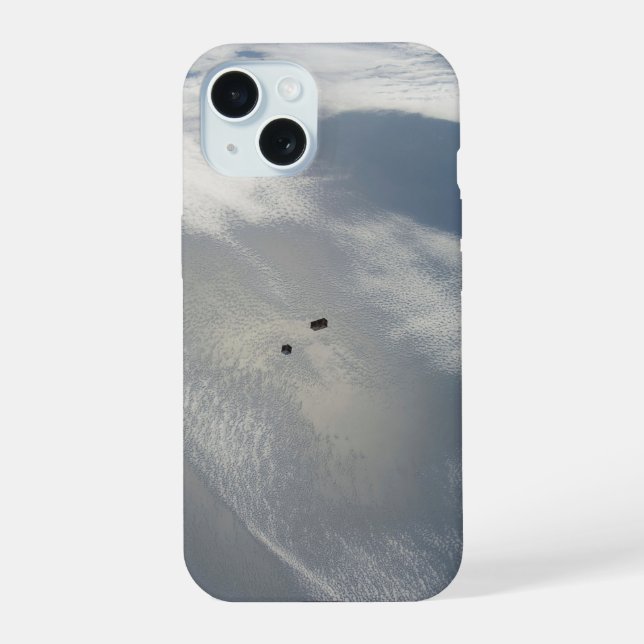 Tiny Satellites Orbit Above A Part Of Earth. iPhone 15 Case (Back)