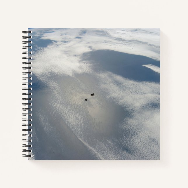 Tiny Satellites Orbit Above A Part Of Earth. Notebook (Front)
