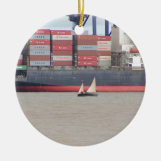 Tiny Yacht And Huge Container Ship Ceramic Ornament