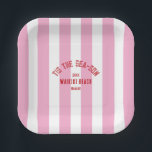 Tis The Sea Son Custom Beach Christmas Pink Stripe Paper Plates<br><div class="desc">The ’Tis The Sea-Son Custom Beach Christmas Pink Stripe Paper Plates add festive flair and seaside charm to your holiday celebrations. Featuring a playful pink cabana stripe design with customizable beach name and year, these durable paper plates are perfect for serving meals, appetizers, or desserts. Convenient and disposable yet stylish...</div>
