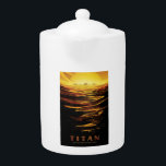 Titan largest moon of Planet Saturn Teapot<br><div class="desc">Humanity's first crewed mission to Titan, shrouded in an orange haze, unveiled a world of alien beauty. Explorers navigated hydrocarbon rivers in specially designed craft, dodging colossal methane icebergs. They marveled at towering dunes sculpted by frigid winds and descended into canyons carved by liquid ethane, searching for signs of life...</div>