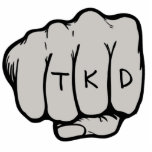 TKD Fist Ornament<br><div class="desc">The martial arts TKD Fist Ornament makes a unique taekwondo gift idea for a birthday,  Christmas,  holiday or belt rank promotion test or exam. This martial arts ornament features a fist design in a middle punch  (courtesy of designious.com) with the letters tkd on the knuckles.</div>