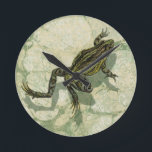 Toad Swinning in the Water Round Clock<br><div class="desc">Vision Studio is using the giclée (French for “to spray”) technique in this art piece. It makes it unique and the different shades of green emphasize the peacefulness on this image. Choose this piece of artwork for your next Zazzle product.</div>
