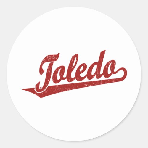 Toledo script logo in red distressed classic round sticker