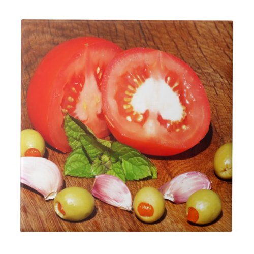 tomato with stuffed olives and garlic tile