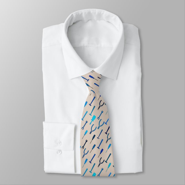 Tools, on medium gray tie (Tied)