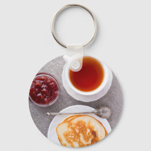 Top view of a plate of hot pancakes with vintage keychain