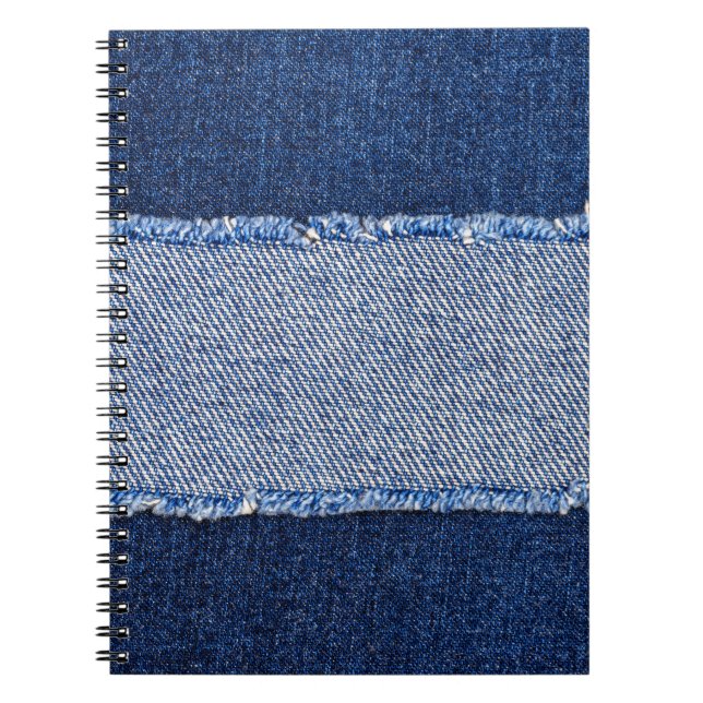 Torn denim: blue jeans fabric. notebook (Front)