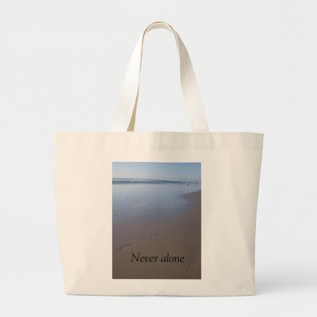 Tote features shore with footprints in the sand. (Front)