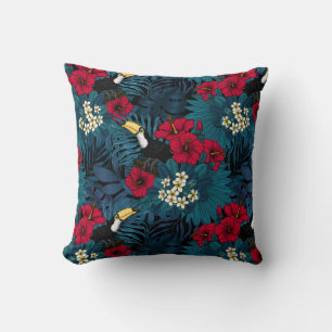 Toucans and tropical flora, green and red throw pillow