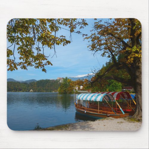 Tourist boats in Lake Bled in autumn Mouse Pad