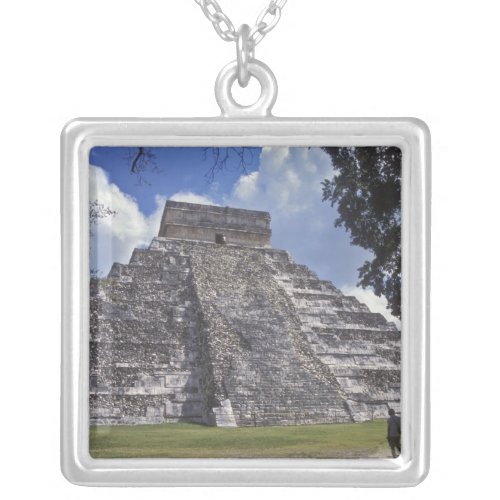 Tourists walk past an unrestored side of El 2 Silver Plated Necklace