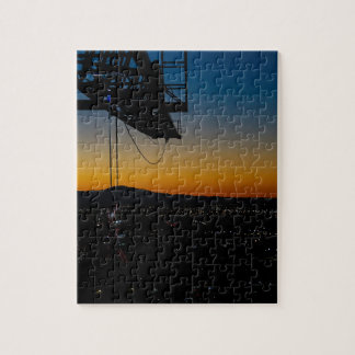 Tower crane puzzle, sunrise looking over downtown jigsaw puzzle