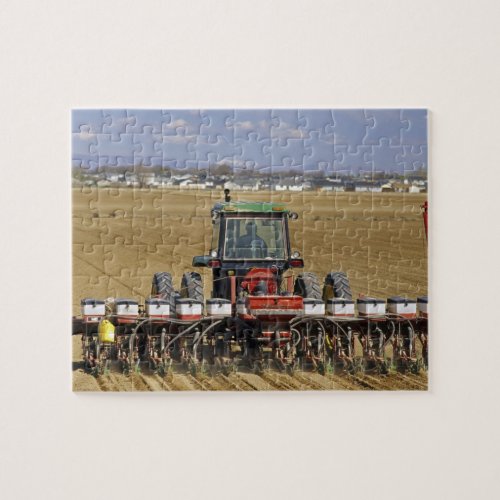 Tractor pulling a seed corn planter jigsaw puzzle