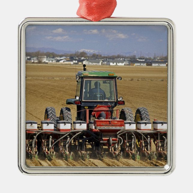 Tractor pulling a seed corn planter. metal ornament (Front)