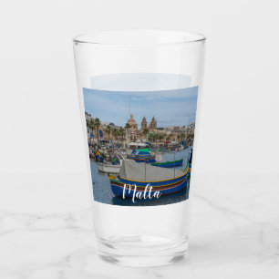 Traditional colorful fishing boats in Malta Glass