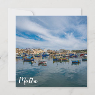 Traditional colorful fishing boats in the harbor