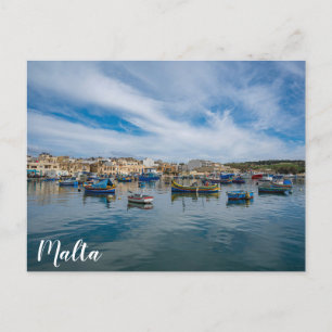 Traditional colorful fishing boats in the harbor postcard
