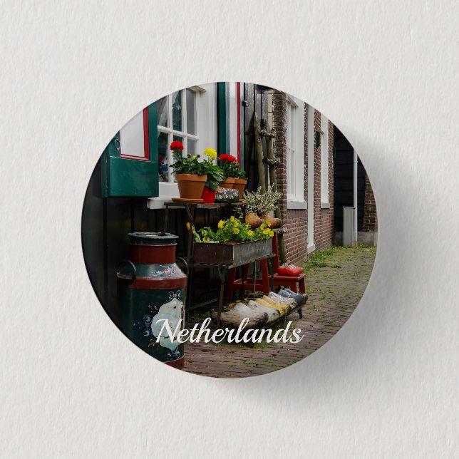 Traditional Dutch wooden shoes on street Button (Front)