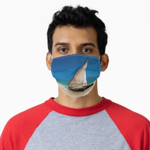 Traditional fishing boat on the beach adult cloth face mask