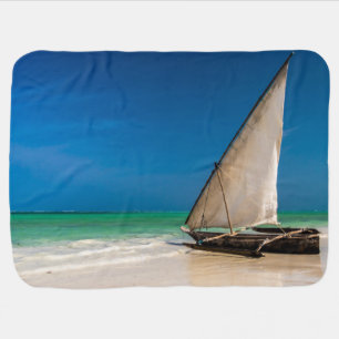 Traditional fishing boat on the beach baby blanket