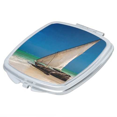 Traditional fishing boat on the beach compact mirror