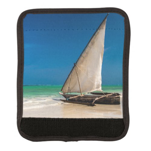 Traditional fishing boat on the beach luggage handle wrap