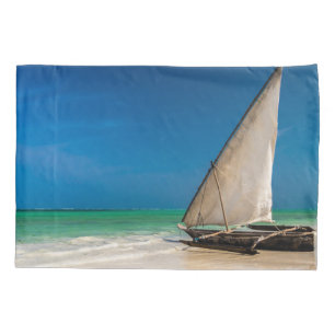 Traditional fishing boat on the beach pillow case